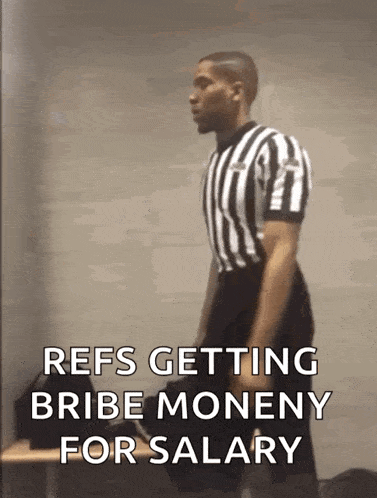a referee in a striped shirt is getting bribed for salary