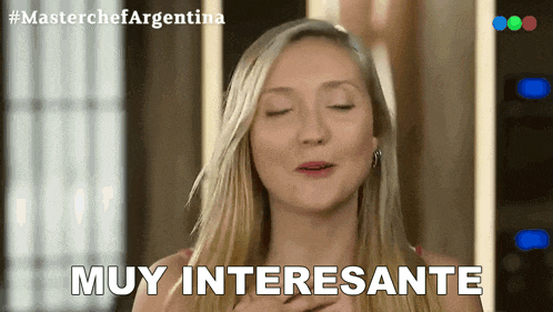 a woman with her eyes closed says muy interesante in spanish