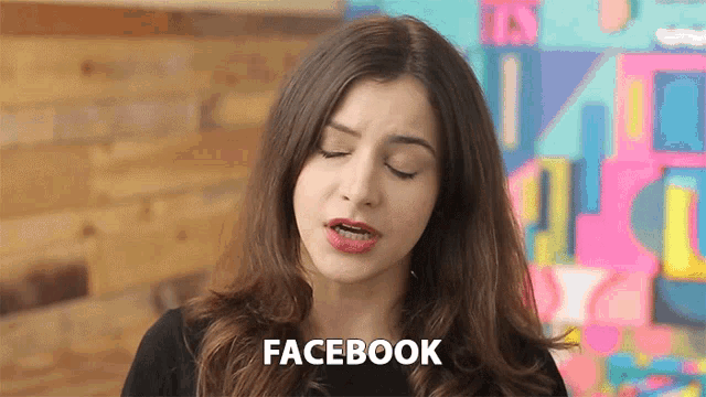 a woman is making a face and says facebook