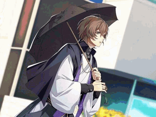 a boy in a kimono is holding an umbrella in his hand