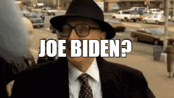 a man wearing glasses and a hat says joe biden