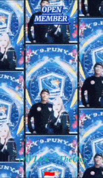 a man and a woman are posing for a picture in front of a sign that says open member