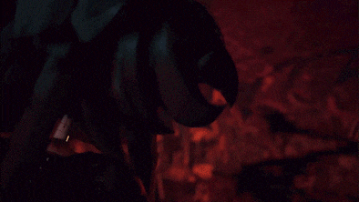 a blurred image of a person 's face with a light shining on it