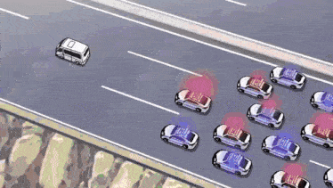 a white van is driving down a highway next to a row of cars