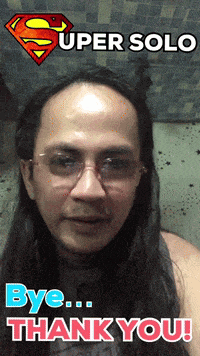 a man with long hair says bye thank you