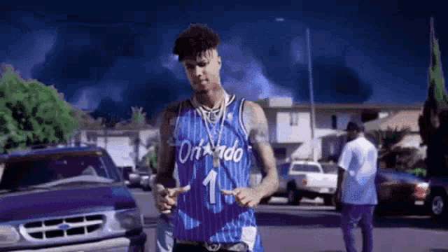 a man wearing an orlando jersey with the number 1 on the front