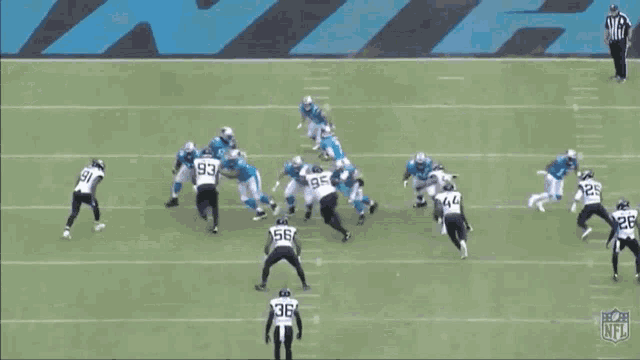 a group of nfl players on a field
