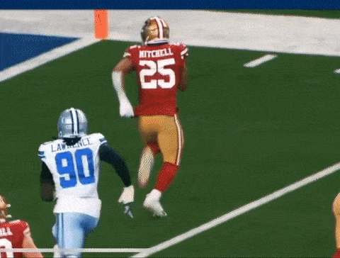 a football player in a red jersey with the number 25 on it