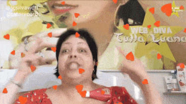 a woman 's face is surrounded by hearts and a star that says web diva