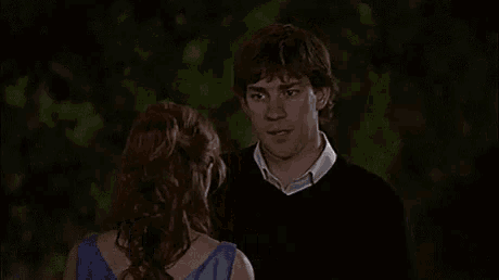 a man and a woman are looking at each other and the man is saying `` ich liebe dich . ''