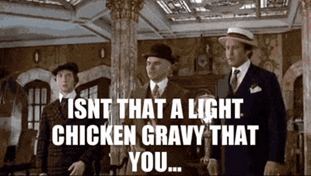 three men in suits and hats are standing in a room with the words isnt that a light chicken gravy that you ..