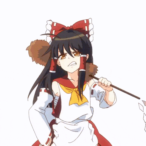a girl with a red bow on her head holds a stick