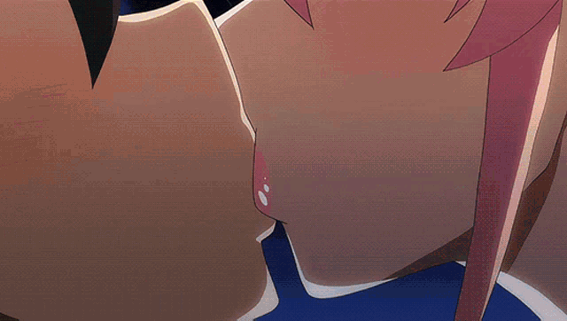 a man and a woman are kissing in a close up of their faces