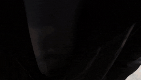 a close up of a man 's neck with a chain around it