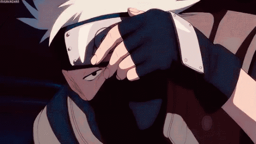 a close up of a person covering their face with a bandana and gloves .