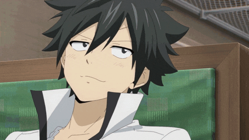 a black haired anime character is sitting on a green cushion