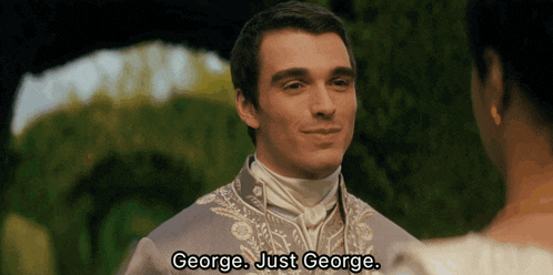 a man talking to a woman with the words george just george