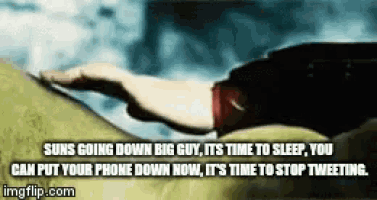 a picture of a person laying down with a caption that says " suns going down big guy its time to sleep "