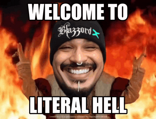 a man wearing a beanie that says blizzard on it is smiling and says welcome to literal hell