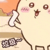 a close up of a cartoon character holding a piece of paper in his hand .
