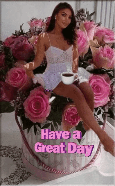 a woman sits in a box of pink roses with a cup of coffee