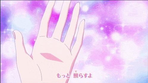 a person is holding a pink bow with hearts on it in front of a purple background