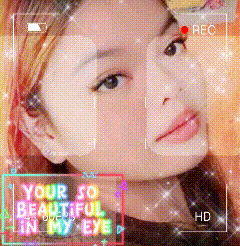 a woman 's face is being recorded with the words your so beautiful in my eye