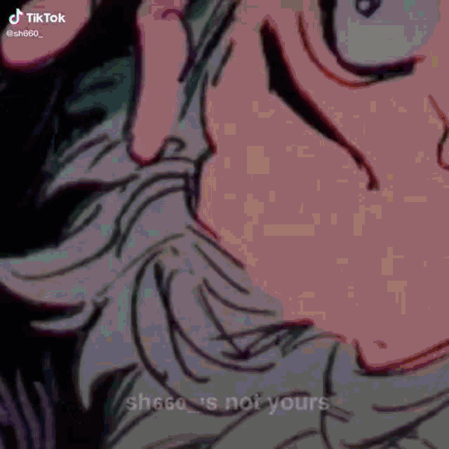 a close up of a cartoon character 's face with a hand reaching out towards it .