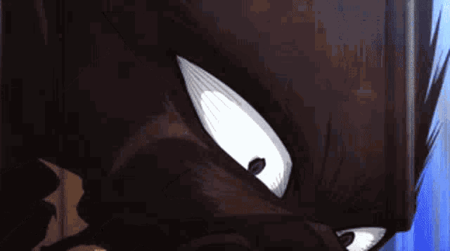 a close up of a cartoon character 's face with a serious look on his face .