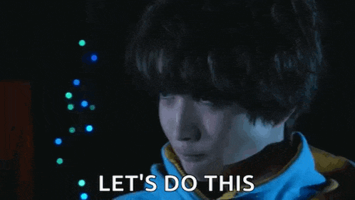 a man in a blue jacket is holding a video game controller in his hand .
