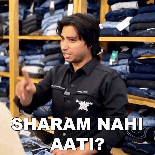 a man in a black shirt says " sharam nahi aati " in a store