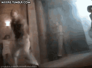 a woman is dancing in a dark room with the website mxxre.tumblr.com visible