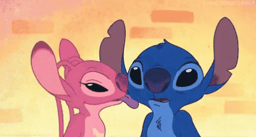 stitch and angel from disney 's lilo and stitch kissing each other .