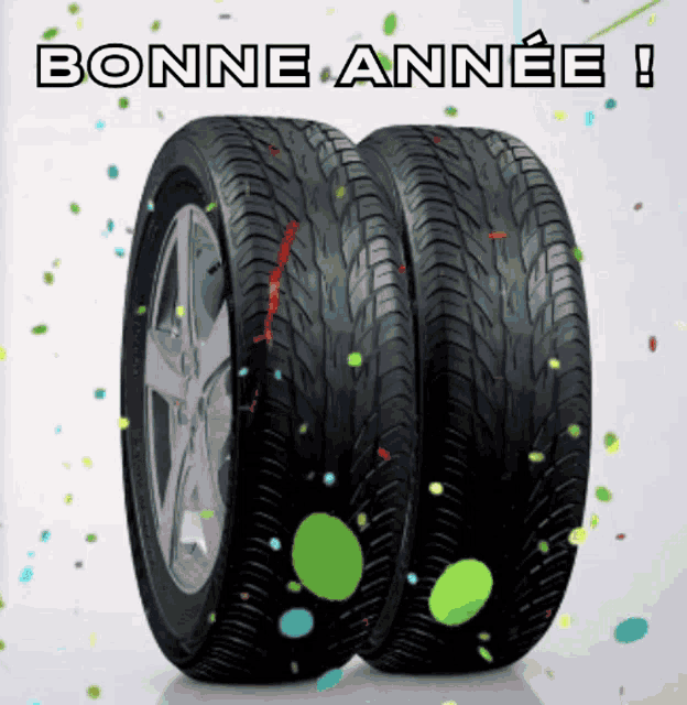 a couple of tires with bonne annee written on it