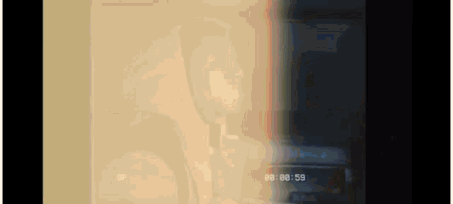 a silhouette of a man wearing headphones is being recorded on a film strip .
