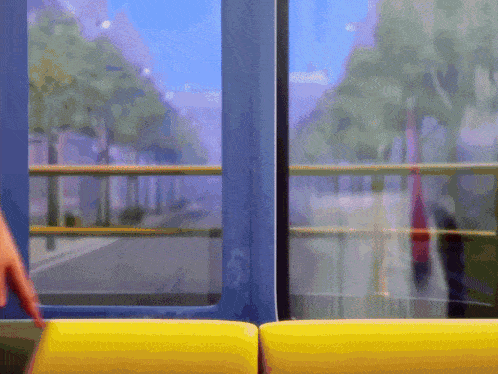 a cartoon drawing of a bus with a blue door and yellow seats