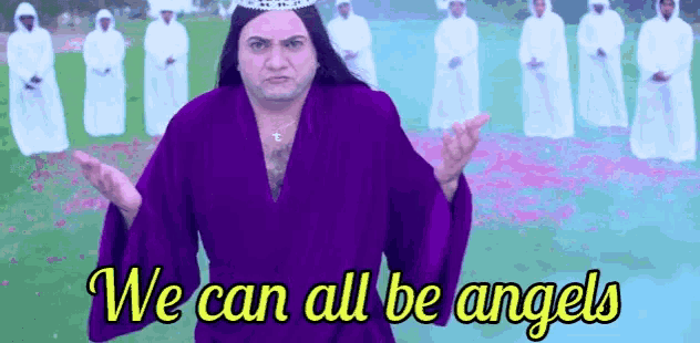 a man in a purple robe is standing in front of angels .