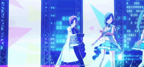 a man and a woman are dancing on a stage in front of a city skyline .