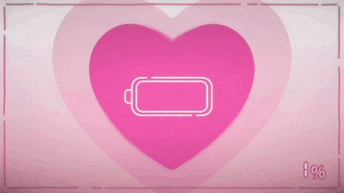 a pink heart with a battery in it