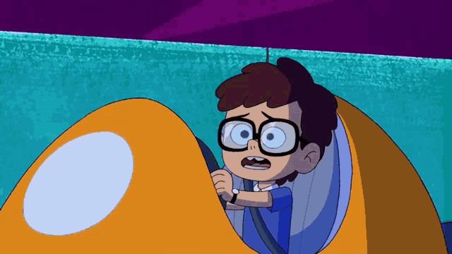 a boy wearing glasses is driving a car