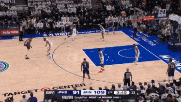 a basketball game is underway at the espn center