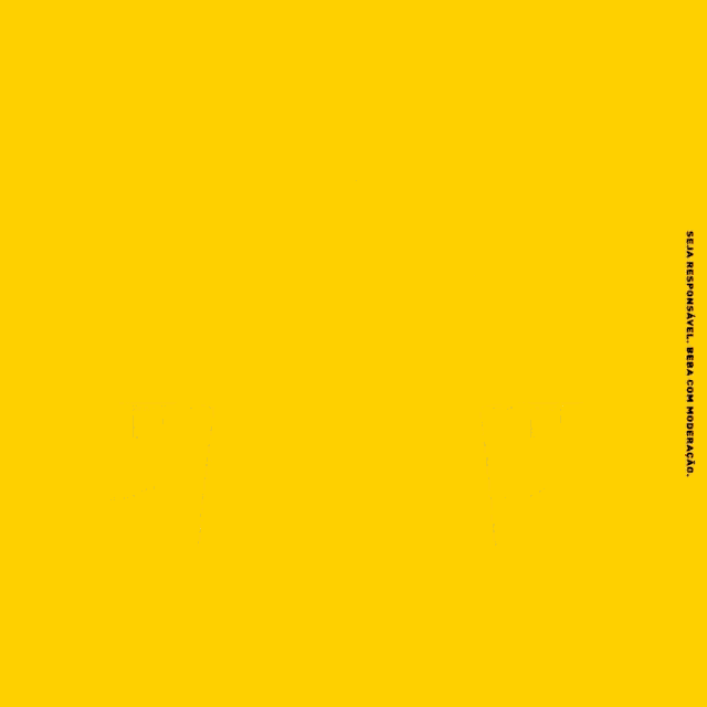 three glasses of whiskey with lemon slices on a yellow background
