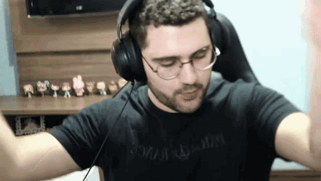 a man wearing headphones and a t-shirt that says ' jonatan ' on it