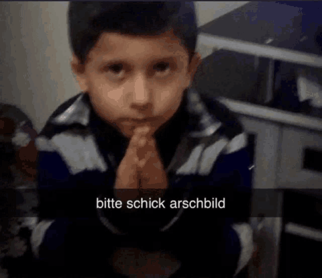 a boy with his hands folded and the words bitte schick arschbild written below him