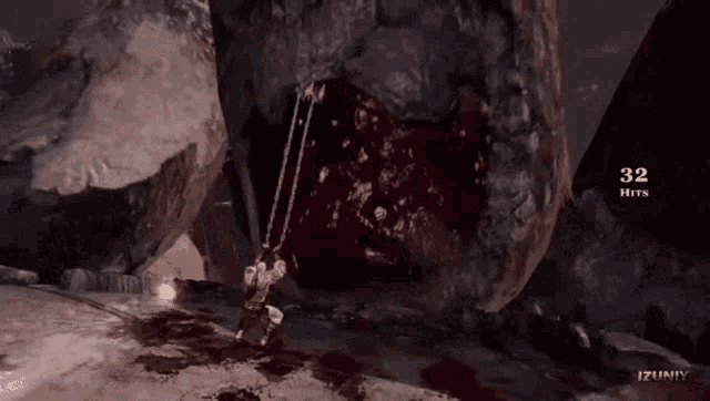 a video game screen shows a giant monster with blood coming out of its mouth