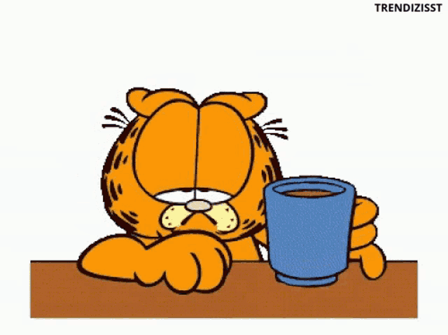 a cartoon of garfield sitting at a table holding a cup