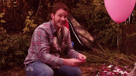 Playing With Flower Petals - Flowers GIF - Flowers Chris Pratt Parks And Recreation GIFs