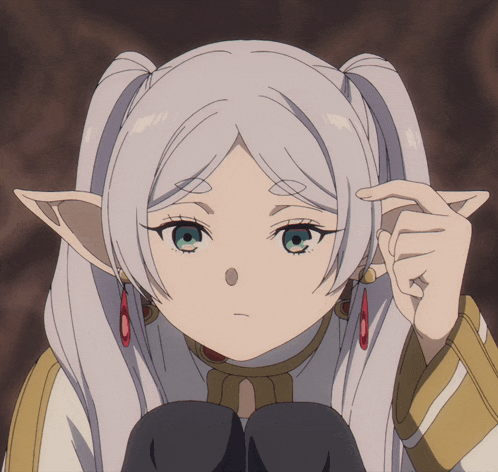 a girl with white hair and blue eyes has pigtails on her hair