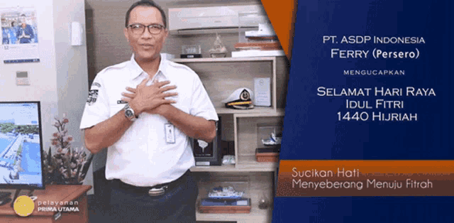 a man stands in front of a sign that says pt asdp indonesia ferry