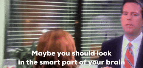 a man in a suit and tie is talking to a woman with the words maybe you should look in the smart part of your brain above him